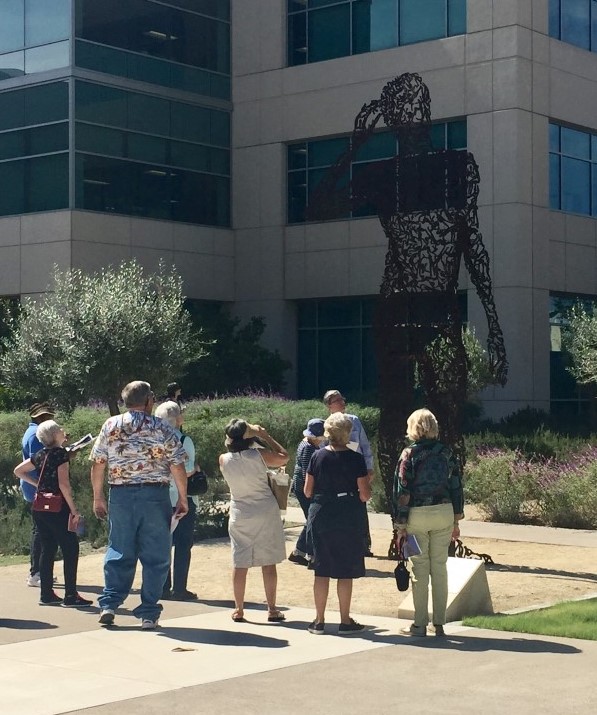 Group taking a tour of the COC Art Collection.